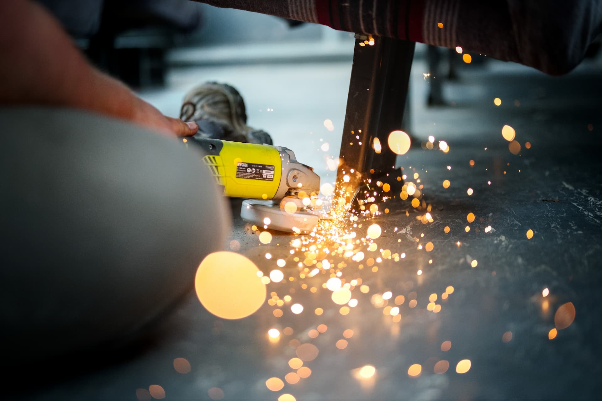 Artistic photo of sparks flying from angle grinder in use
